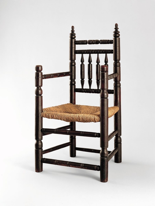 Spindle-Back Armchair Woven Rush Seat Turned Posts Dark Wood Colonial