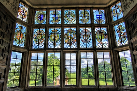 Stained Glass Window Heraldic Shields Stone Mullions Tudor Revival Interior