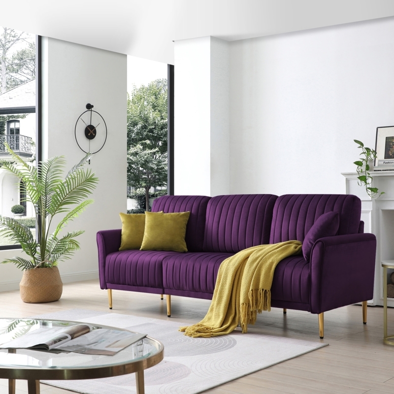 Three Seat Sofa featuring Vertical Channel Tufting and Gold Legs