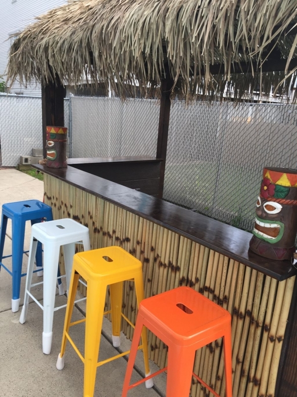 Tiki Bar Set with Thatched Canopy and Multi-Colored Stools