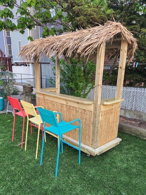 Tiki Bar with Thatched Roof and Vibrant Seating, Tropical Style