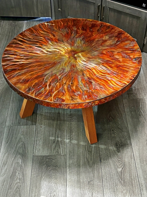 Torched Copper Coffee Table with Sunburst Pattern and Tripod Base
