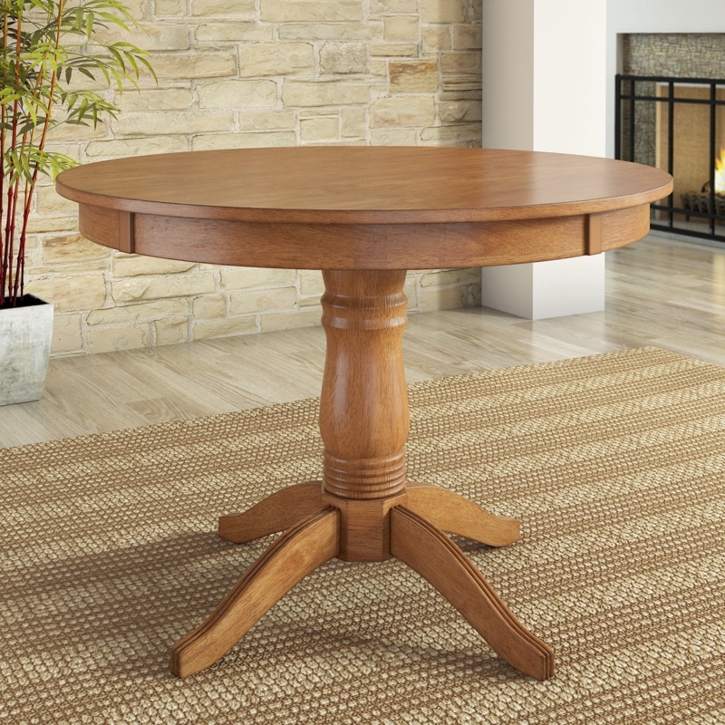 Traditional Warm Oak Pedestal Dining Table with Turned Post and Four Feet