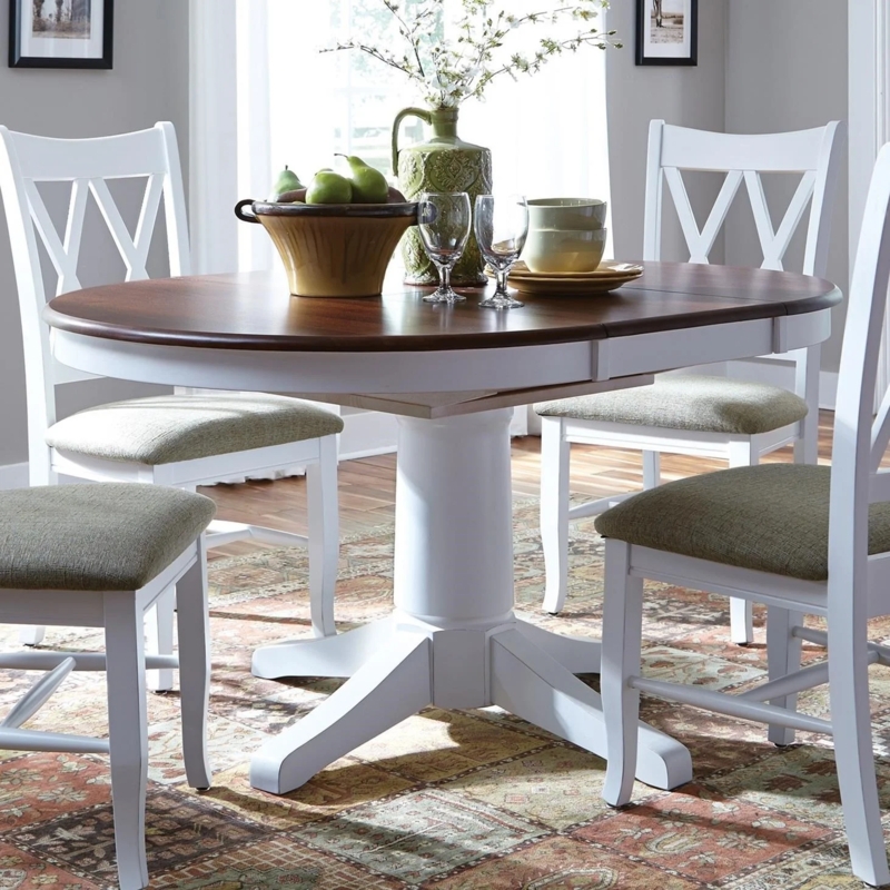 Transitional Dining Set with Two-Tone Pedestal and Sage Green Chairs