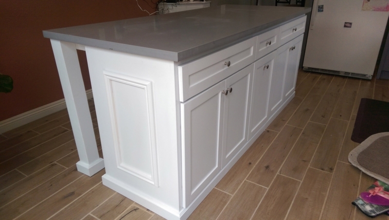 Transitional Kitchen Island With Picture Frame Molding And Seating