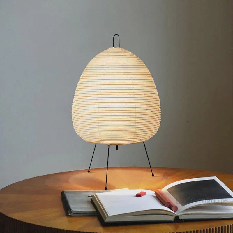 Tripod Rice Paper Lamp with Egg Shaped Shade and Thin Black Legs