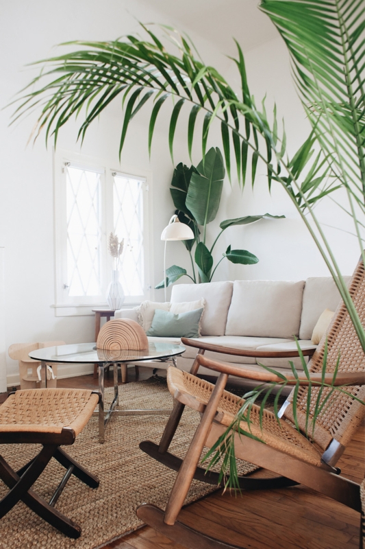 Tropical Modern Rocking Chair with Woven Rattan and Palm Foliage