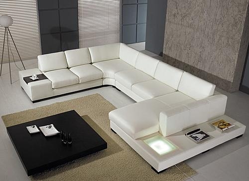 U-Shaped Sectional Sofa with Integrated Shelving Lights and Side Tables