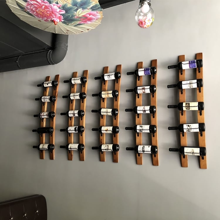 Vertical Wood Wine Rack with Curved Slats and Metal Cradles.