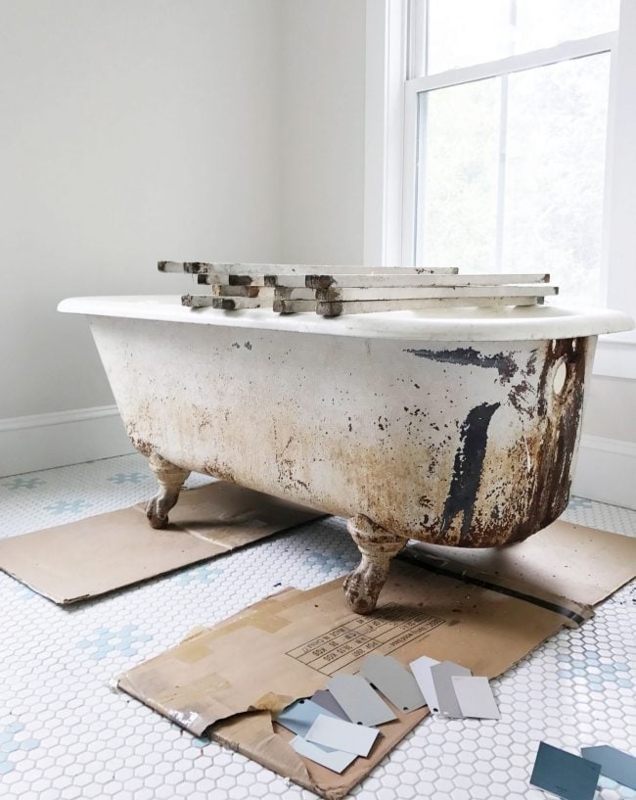 Vintage Clawfoot Bathtub with Distressed White Paint & Ornate Eagle Feet