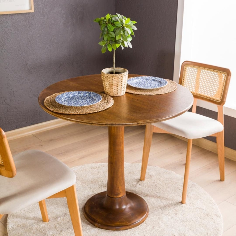 Walnut Pedestal Dining Table in a Cane Back Breakfast Nook Setting