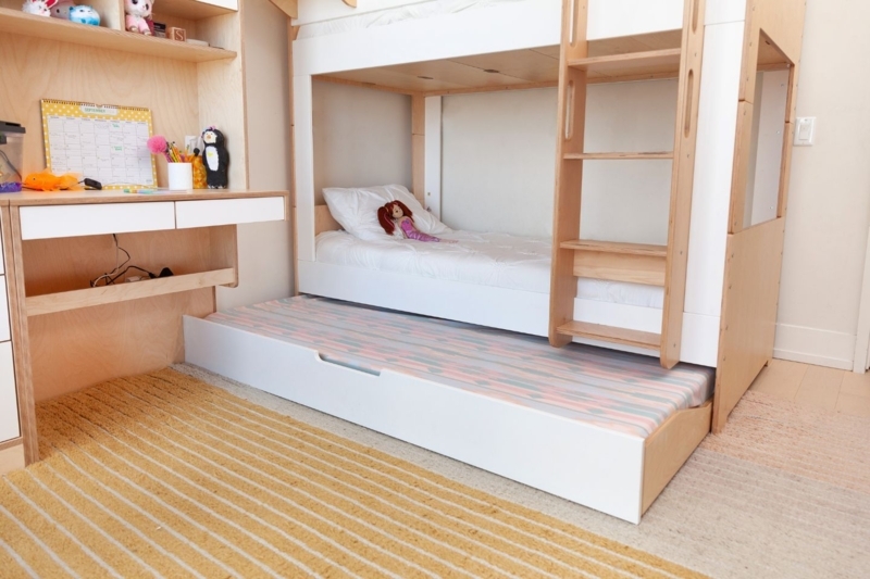 Warm Birch Bunk Bed with Built In Desk, Trundle, and Cutout Handles.
