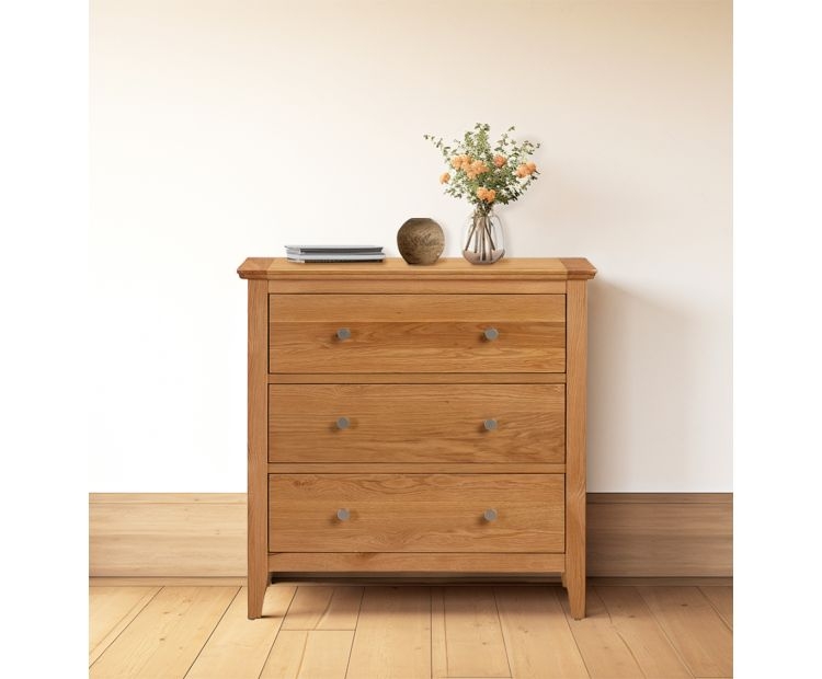Warm Oak Chest Dual Circular Knobs Tapered Legs Transitional