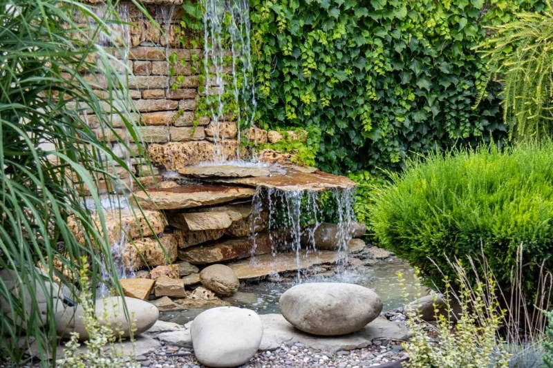 Water Fountain with Multi-Tiered Cascade and Natural Rock Design