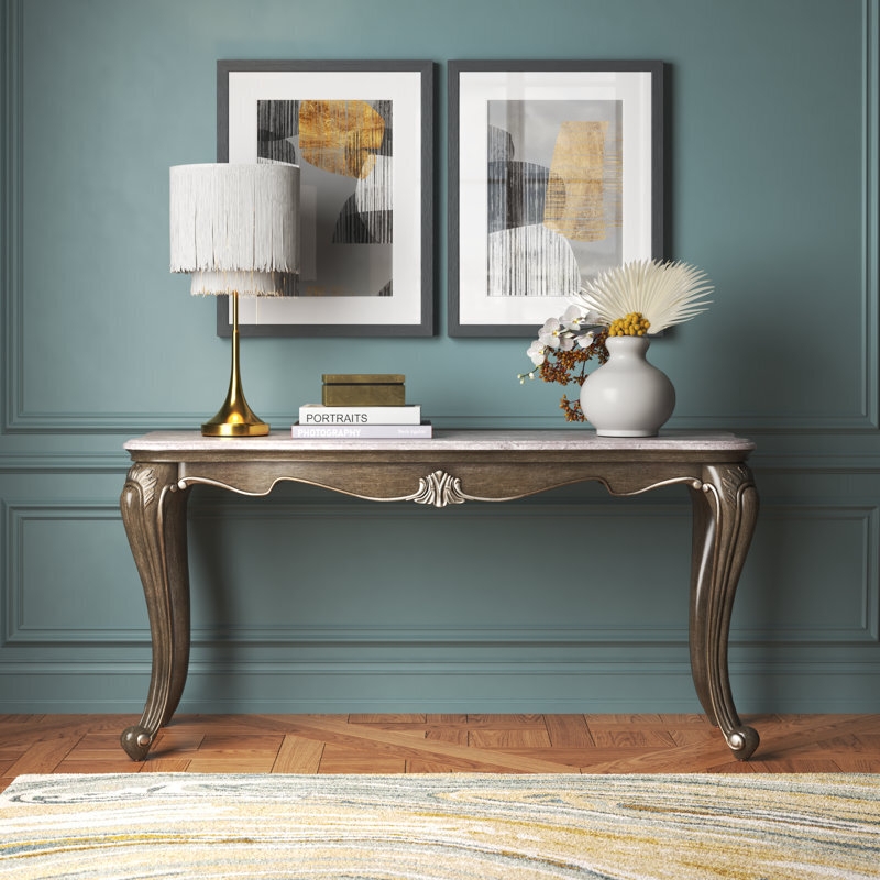 Weathered Console Table: Stone-Like Top, Shell Motif, Metallic Feet