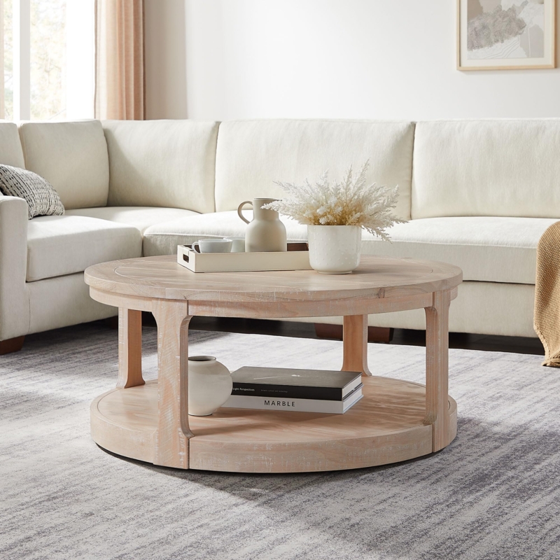Whitewashed Round Coffee Table featuring Two-Tier Curved Supports