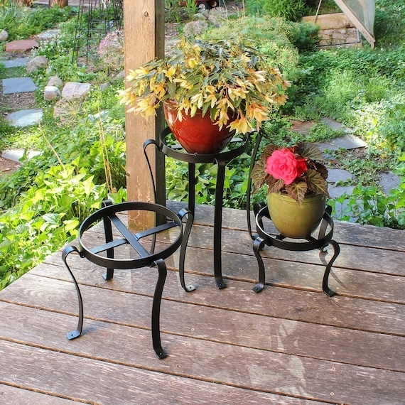 Wrought Iron Plant Stand Set with Varying Heights and Curved Legs