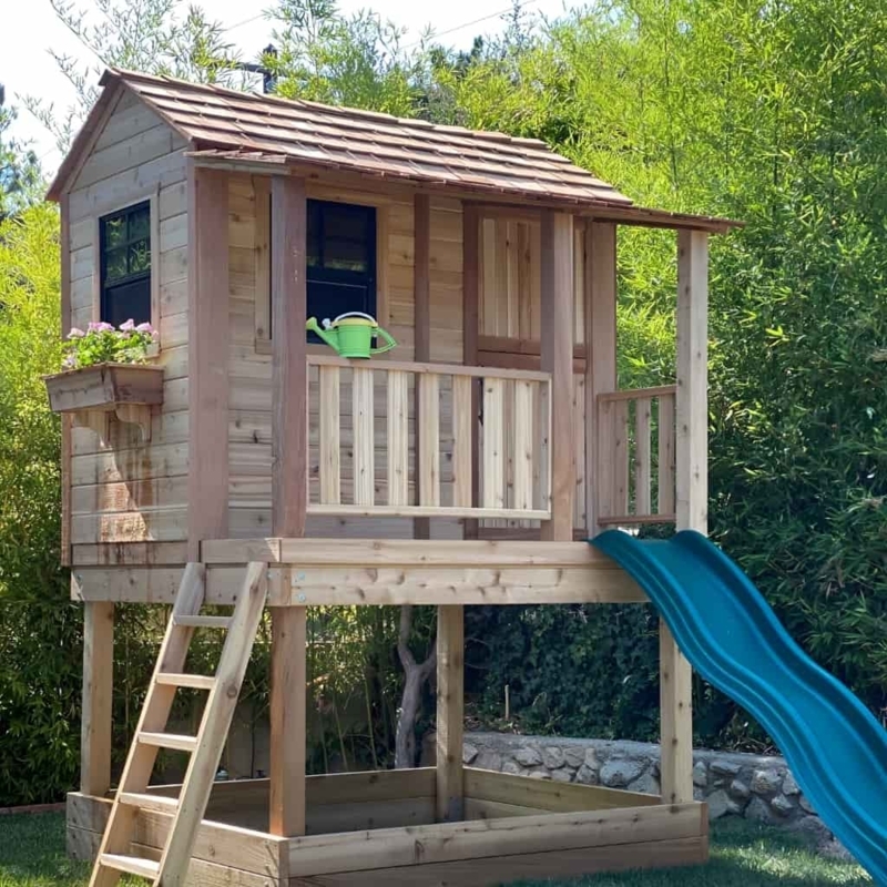 Cedar Playhouse with Teal Wavy Slide and Sandbox Base