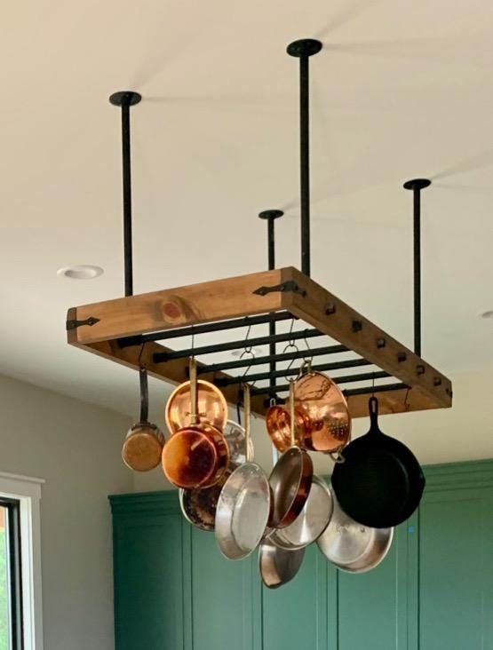 Hanging Pot Rack: Reclaimed Wood Frame with Industrial Pipe Supports.