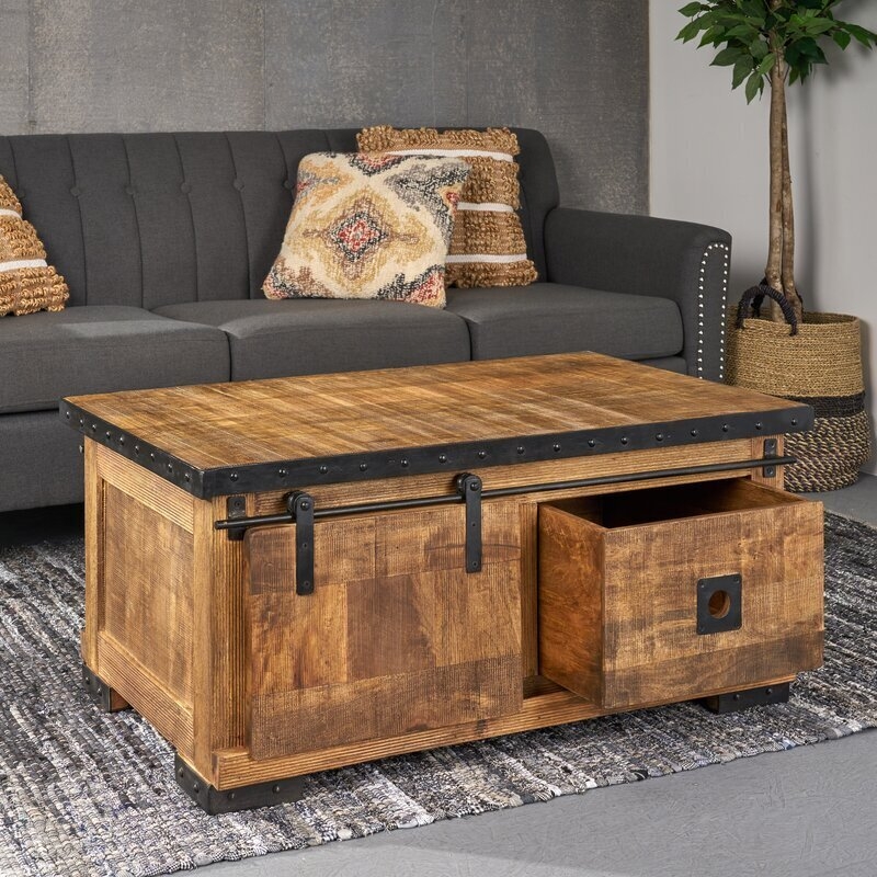 Industrial Barn Door Coffee Table with Riveted Trim