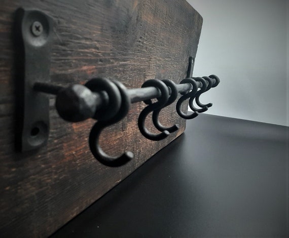 Iron Rod Rack on Distressed Wood Back