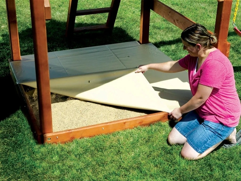 Protective Tan Fabric Sandbox Cover with Snap Fasteners and Wood Frame