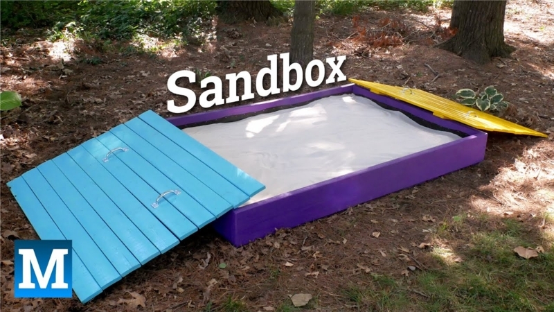 Vibrant Purple Painted Wooden Sandbox with Multi-Colored Folding Lids