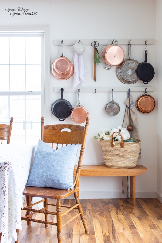 Wall Pot Rack: Rustic European Cottage Style with Double Wooden Rails.