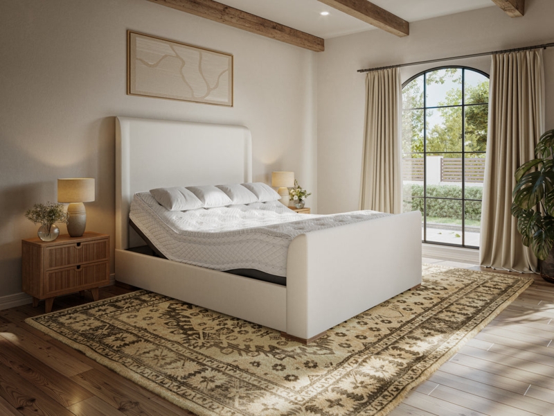 Adjustable Bed featuring a Tall Cream Upholstered Headboard
