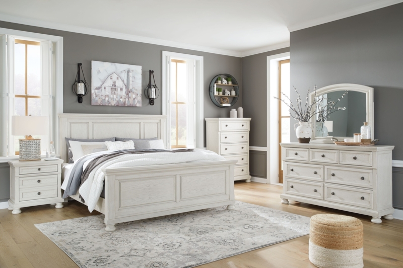 Antique White Bedroom Set with Distressed Finish and Paneled Silhouette