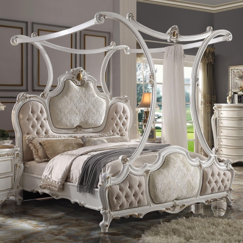 Antique White Canopy Bed with Gold Carvings and Scrolled Top