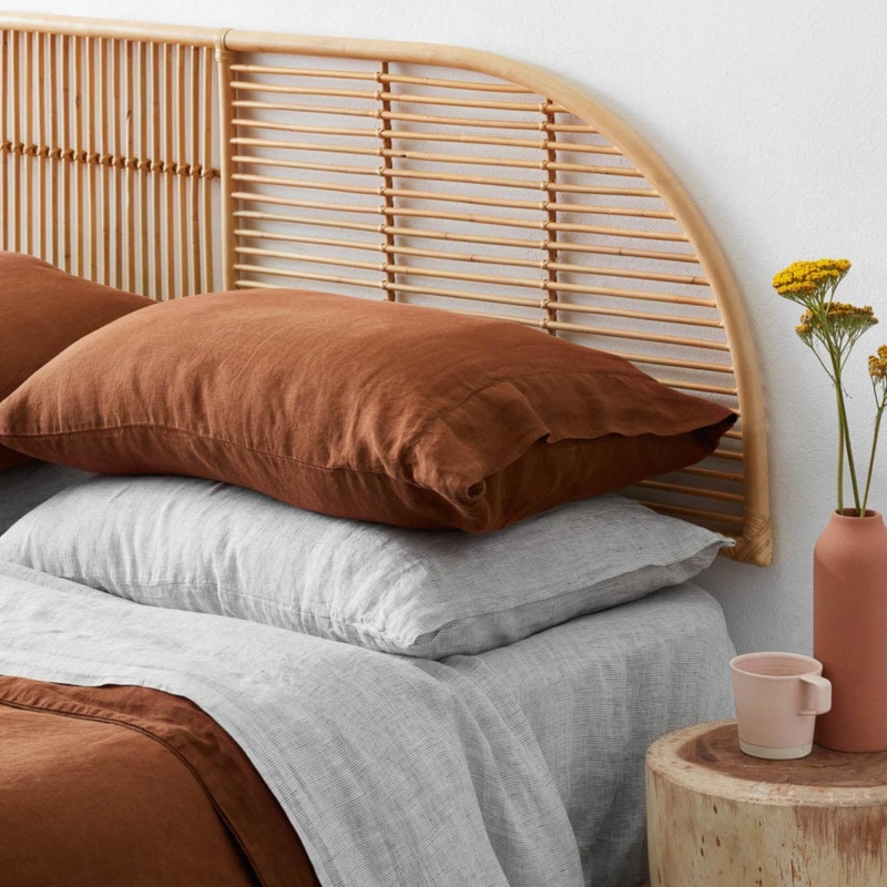 Arched Rattan Headboard with Open Horizontal Slat Design