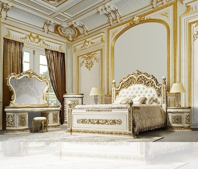 Bed with Ornate Gilded Scrollwork and Tufted Headboard