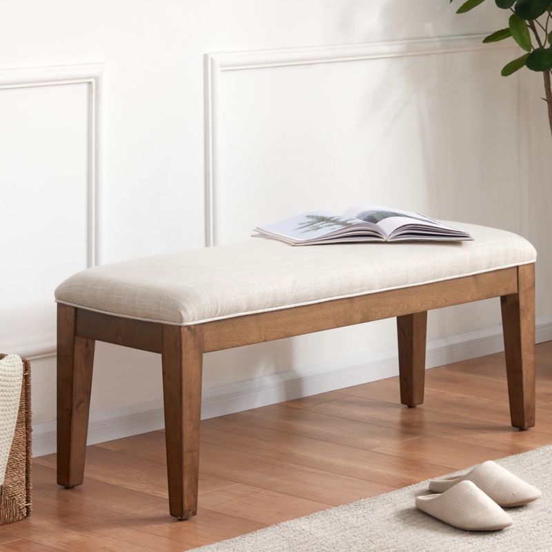 Beige Upholstered Bench with Piping Detail and Wood Legs