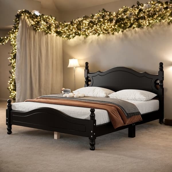 Black Wood Platform Bed with Arched Headboard and Finials