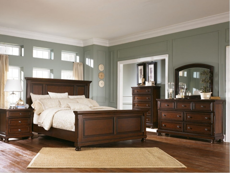 Dark Wood Panel Bed with Traditional Bun Feet and Recessed Paneling