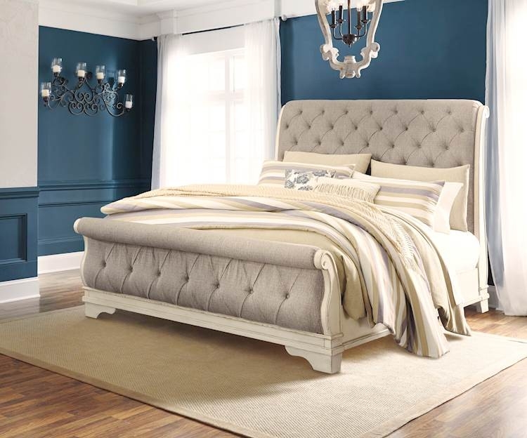 Distressed White Sleigh Bed with Button Tufted Upholstery