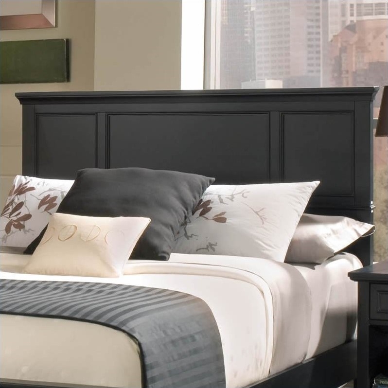 Ebony Headboard featuring Molded Top Rail and Transitional Panel Design