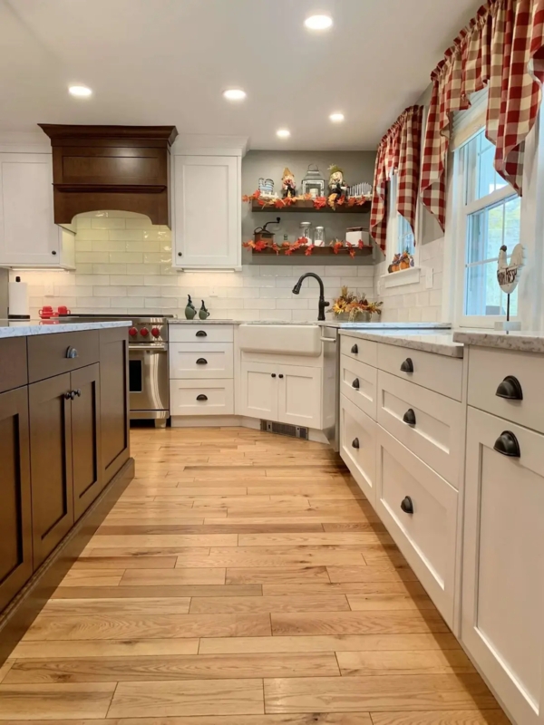 Farmhouse Kitchen with Two-Tone Cabinets and Gingham Curtains