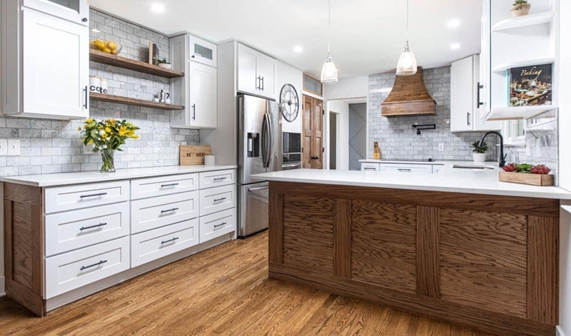 Farmhouse Kitchen with Wood-Wrapped Range Hood and Island