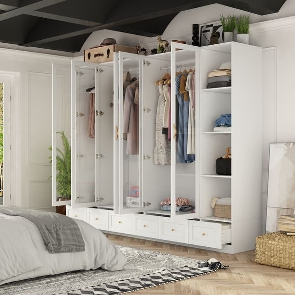 Glass Front Armoire System with Integrated Base Drawers.