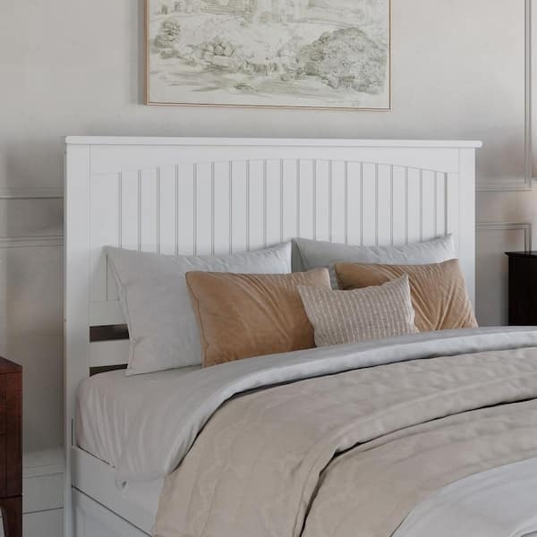Headboard Featuring Beadboard Slats and Arched Silhouette
