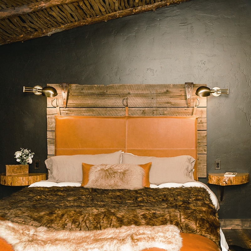 Headboard with Leather Hanging Straps and Rustic Style