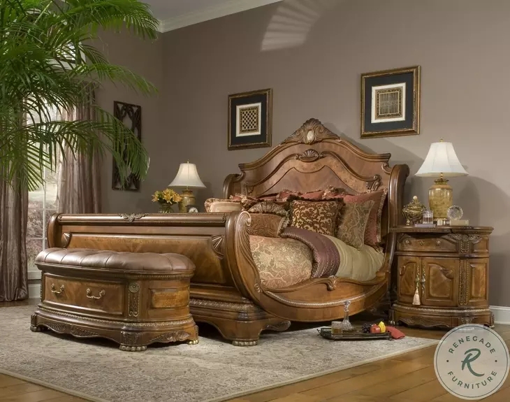 Honey Walnut Sleigh Bedroom Set featuring Ornate Carvings and Storage Bench