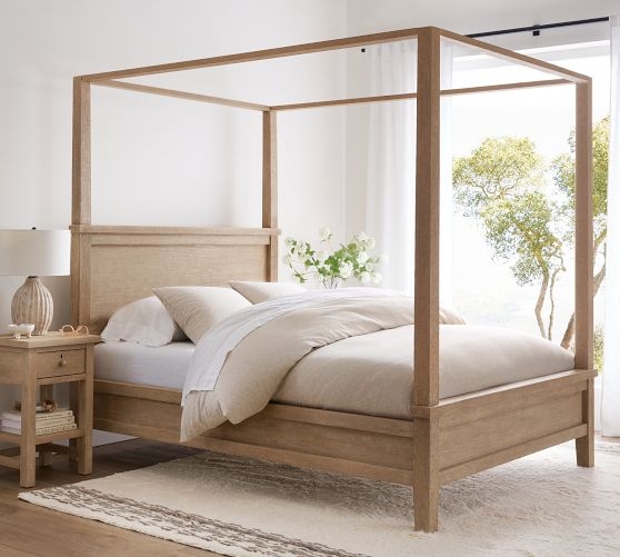 Light Wood Canopy Bed in Seadrift Finish with Paneled Headboard