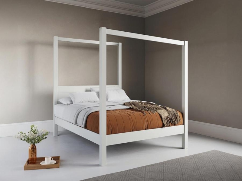 Minimalist Four Poster Bed with Cinnamon Quilted Bedding Decor