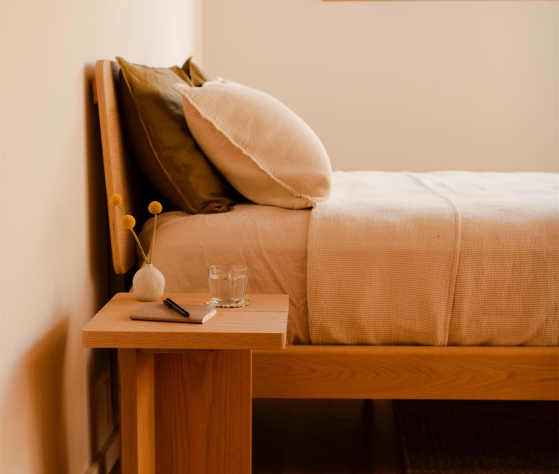 Minimalist Headboard with Integrated Side Ledge and Warm Oak Tone