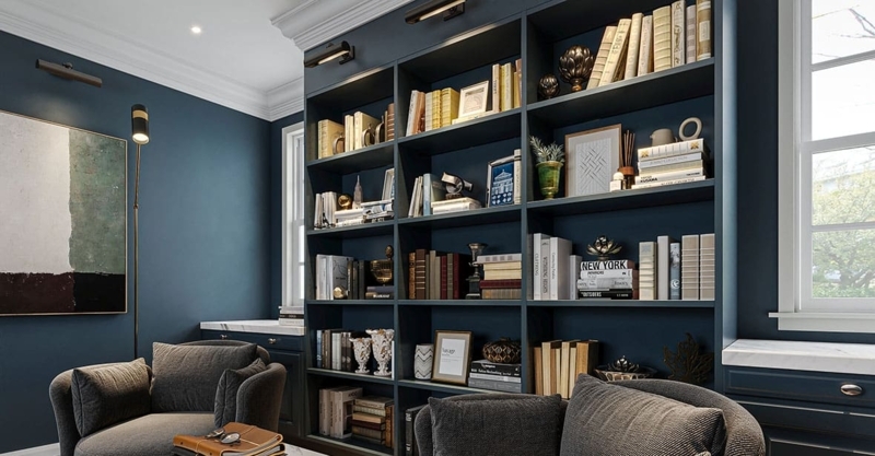 Navy Built-In Bookcase with Marble Tops and Picture Light Accents
