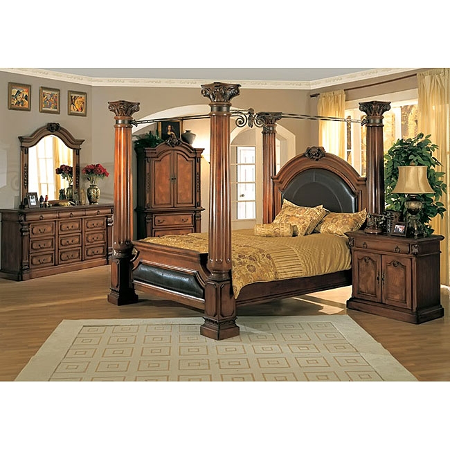 Opulent Canopy Bed featuring Carved Corinthian Columns and Dark Wood