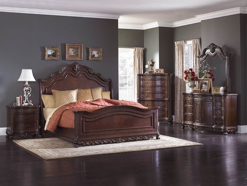 Ornate Dark Wood Sleigh Bedroom Set Featuring Carved Shell Motif